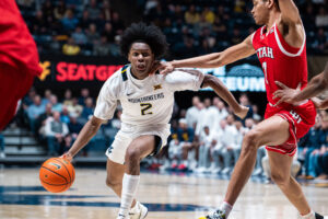 Utah never trails in 61-56 upset against West Virginia
